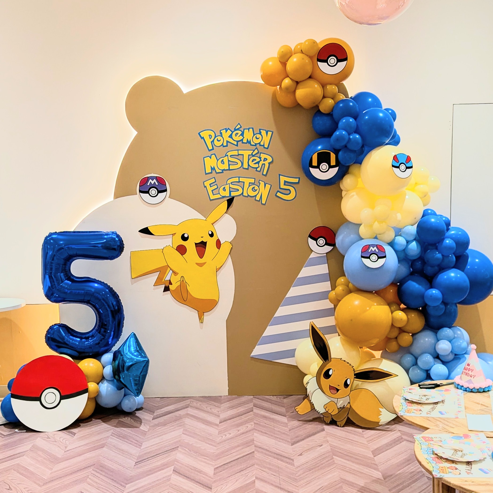 Pokémon themed birthday party balloon setup