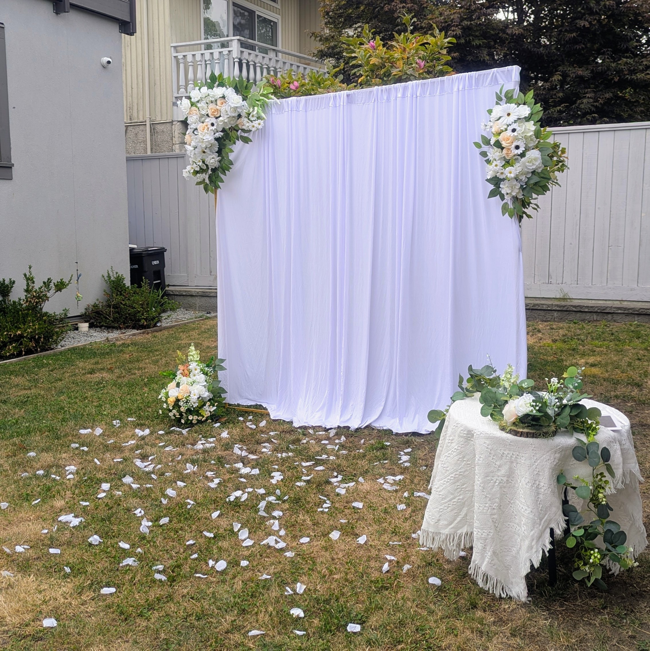 Outdoor elopement floral backdrop